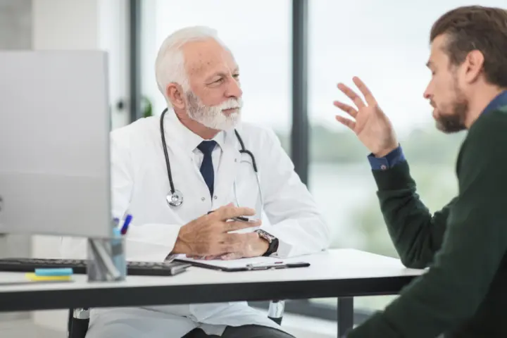 Doctor talking with a patient in a clinic