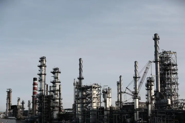 Industrial manufacturing plant with towers and pipes