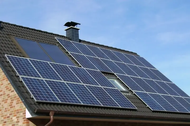 Solar panels installed on a house rooftop