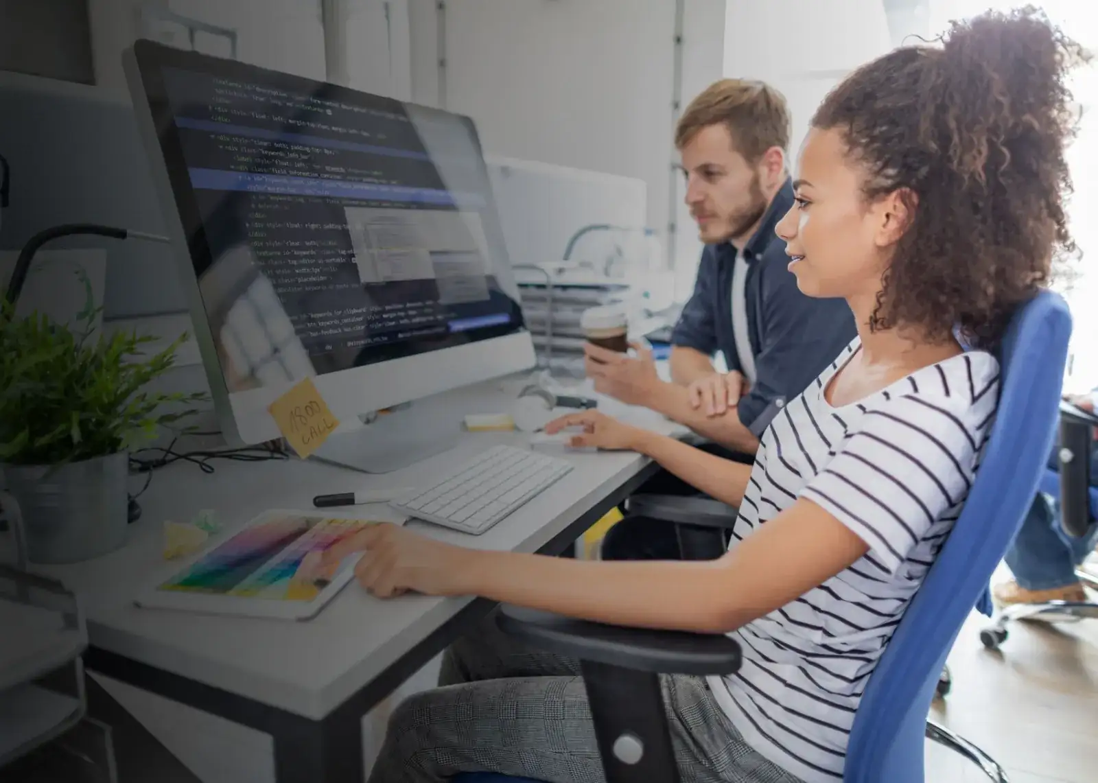 Software developers building a custom CRM